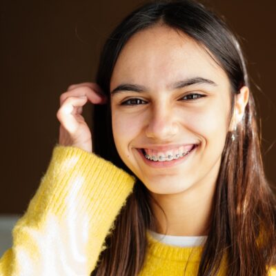 girl with braces smiling
