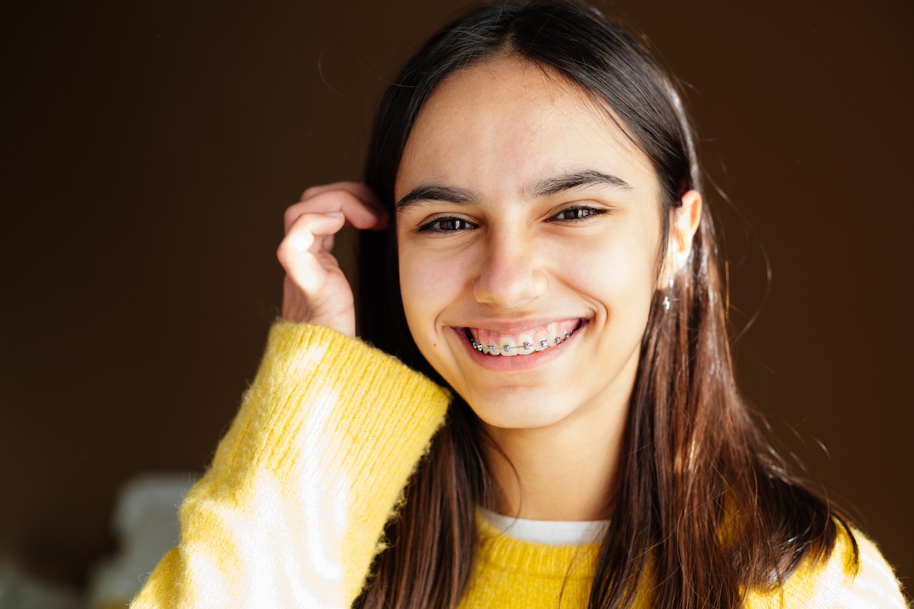girl with braces smiling