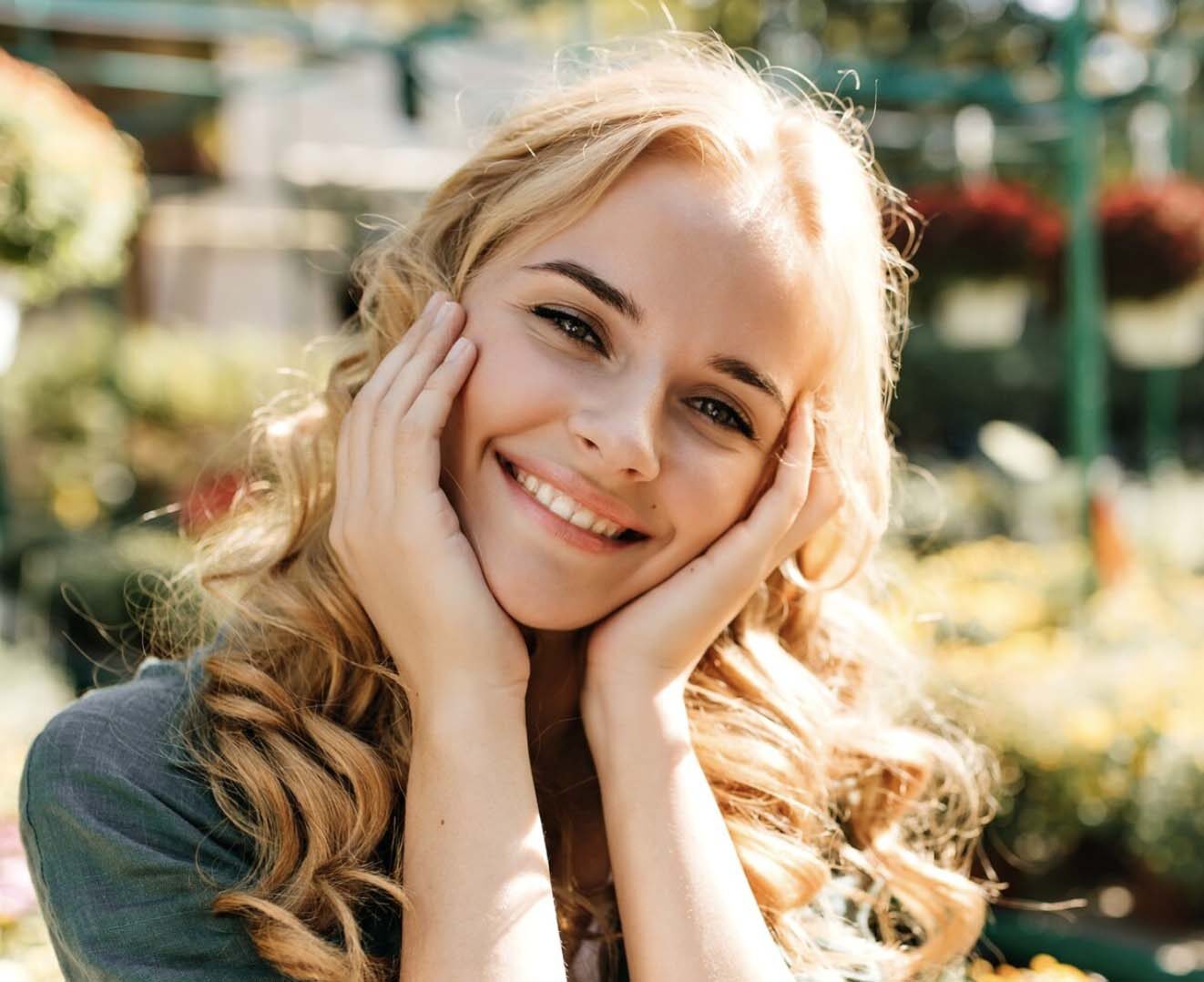 Woman with blonde hair smiling