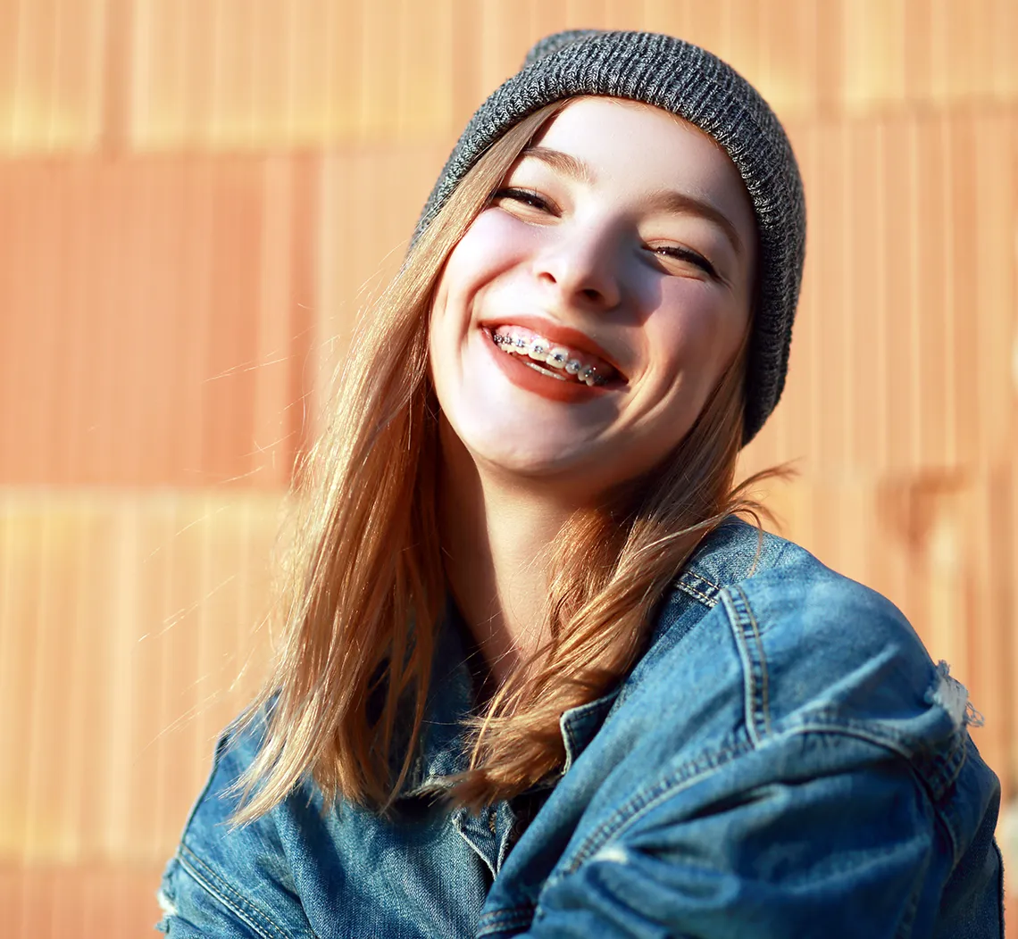teen girl in beanie with braces