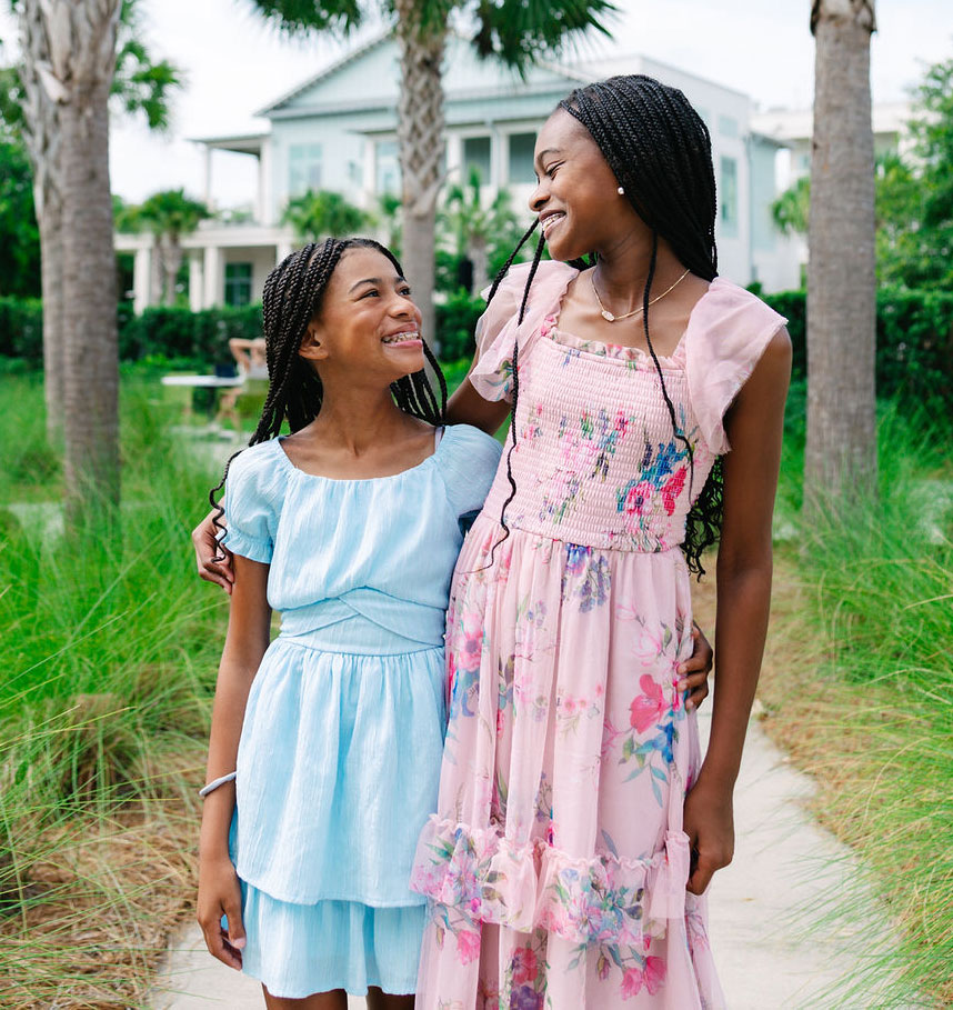 sisters smiling at each other
